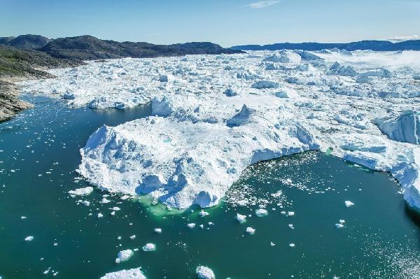Hversu mikið mun land rísa við Grænland ef jökullinn þar bráðnar?